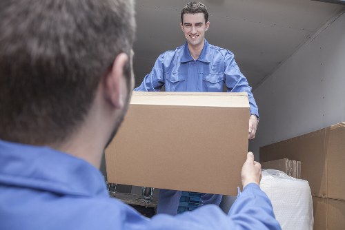 Person using a keyboard and screen reader with an accessible moving service website