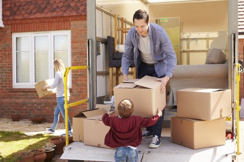 A man with a van assisting a customer with a move in Hackney