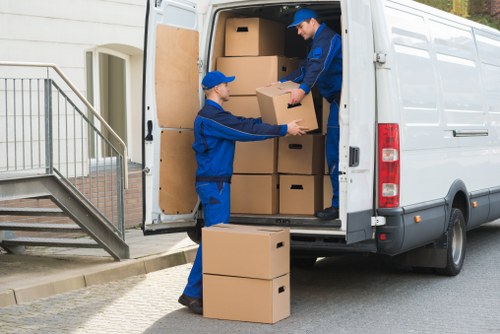 Protective wrapping and careful loading for piano removals in Hackney