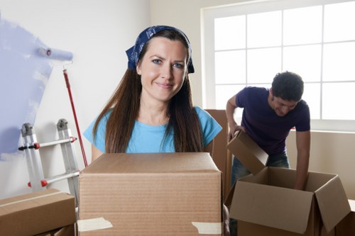 Packed boxes and furniture ready for transport during a local move