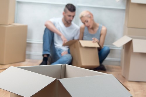 Staff handling furniture carefully during a move