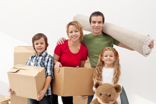 Local removals team planning a move in Hackney near apartment buildings