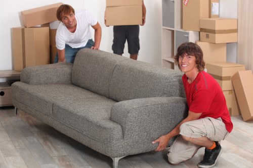 Packing and loading household items into a van in East London