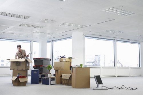Packed moving boxes and home items prepared for a Hackney house relocation