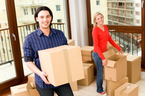Business relocation process with labelled office items and equipment