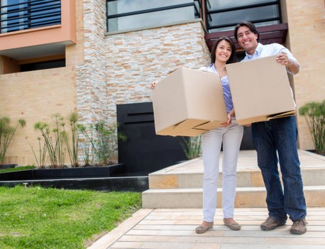 Careful furniture loading by local house removalists in a Hackney residential area